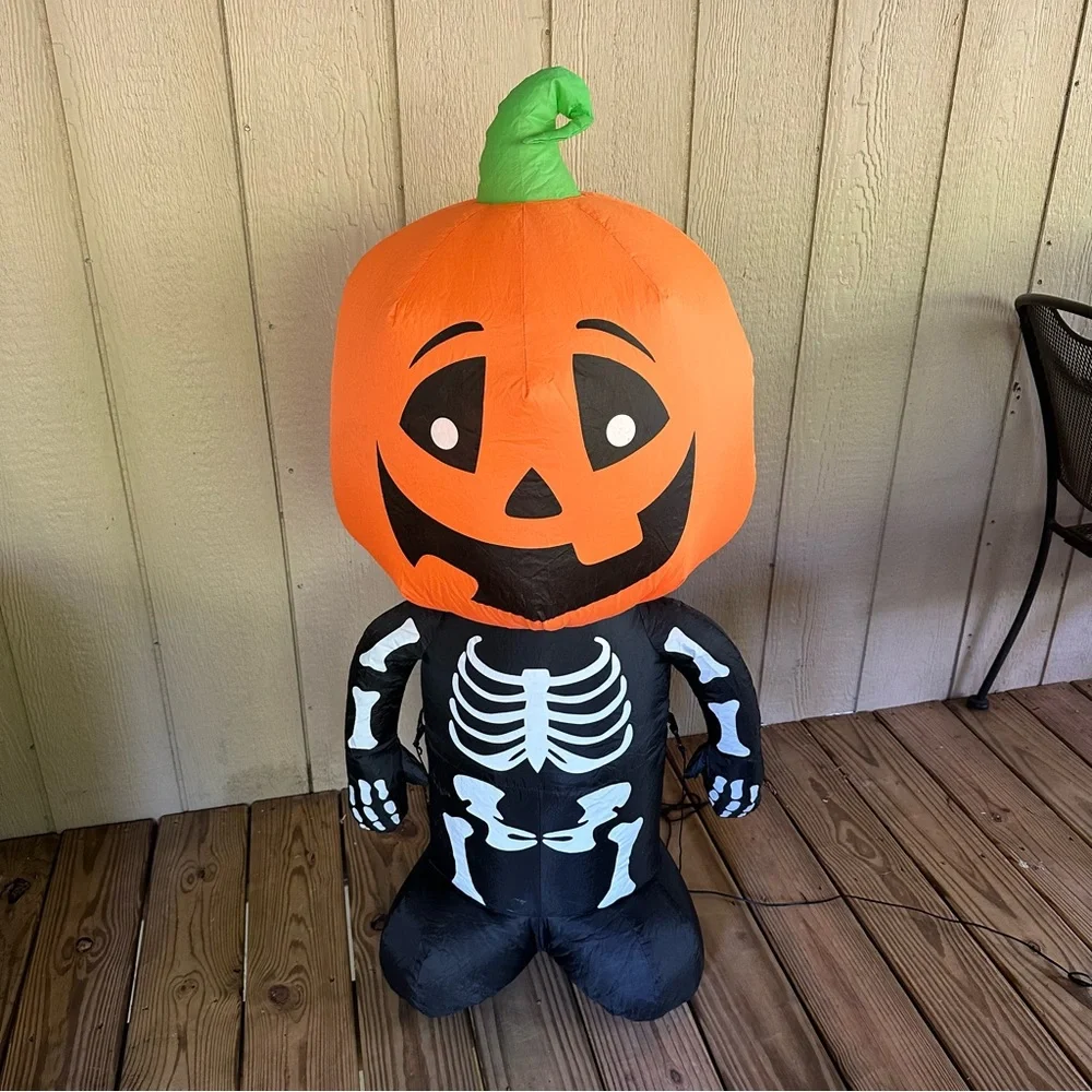 Home Accents Holiday 3.5 ft. Pre-lit Inflatable Happy Pumpkin Boy Skeleton LED